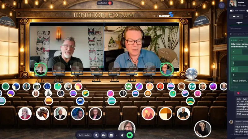 A virtual conference auditorium with speakers on stage and dozens of participants